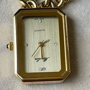 Moulin necklace watch battery gold tone